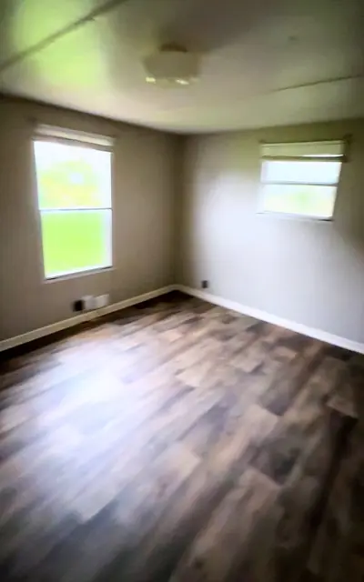 Master bedroom with two windows